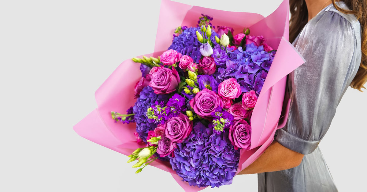 Purple Dream bouquet of purple hydrangea and pink roses by Coral Flowers London