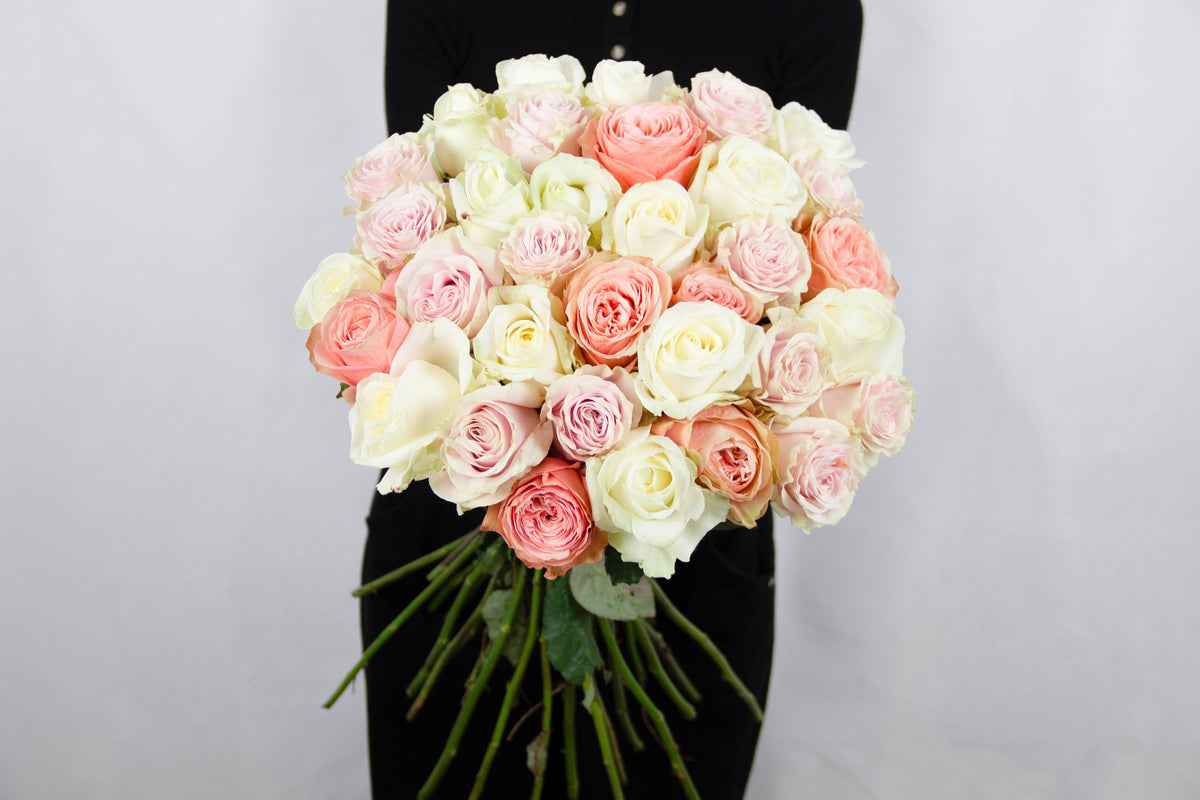 Love Candy bouquet of ivory and dusky pink roses by Coral Flowers London
