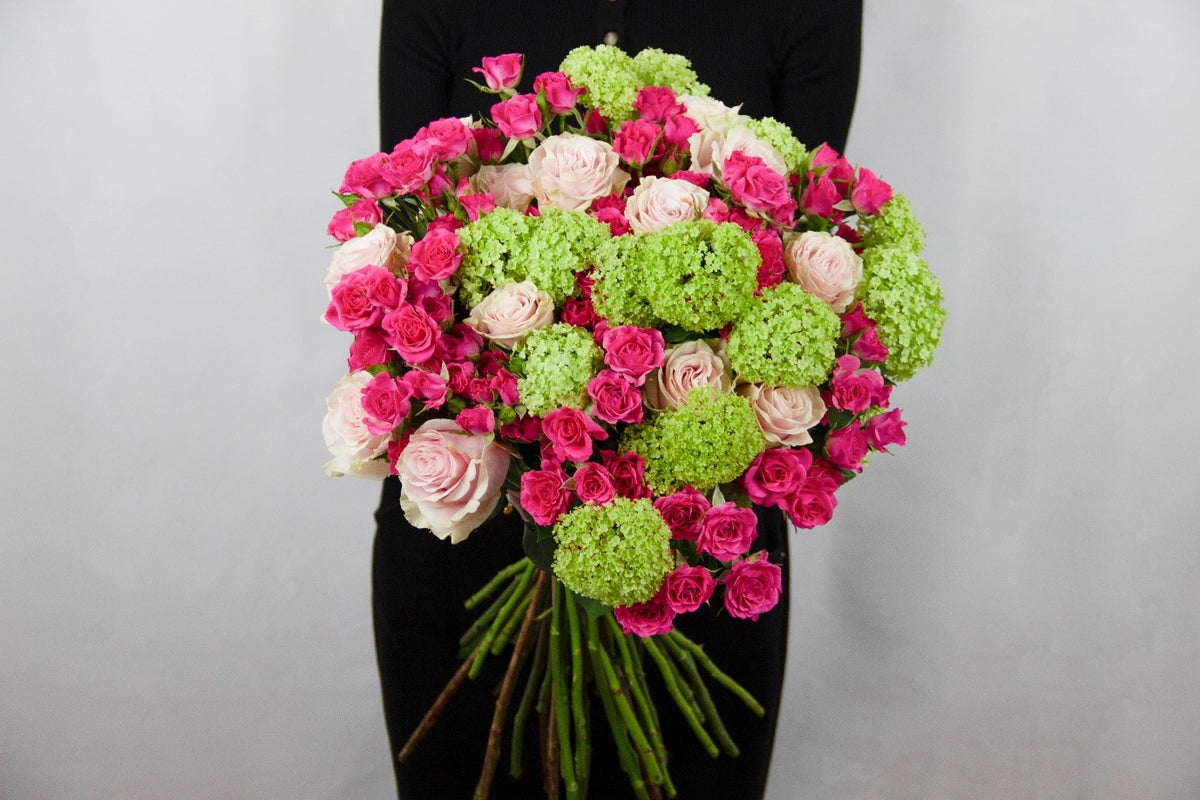 Happiness bouquet of white Avalanche roses and pink spray roses by Coral Flowers London