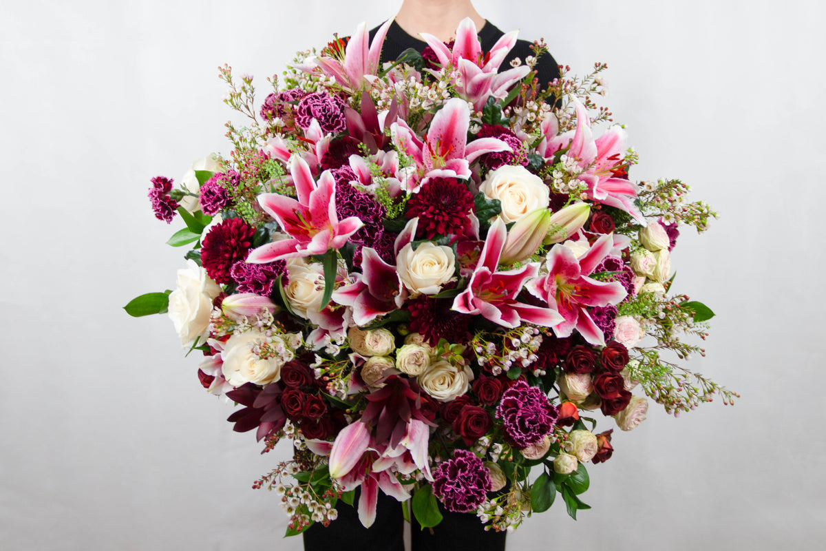 Venigreti mixed bouquet of roses, chrysanthemums, carnations and pink lilies by Coral Flowers London