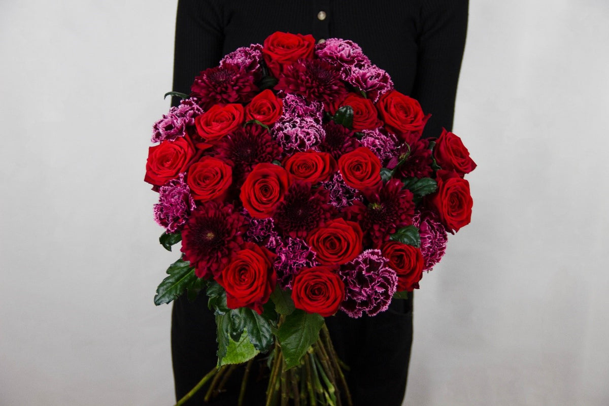 Natali bouquet of purple carnations, roses and red chrysanthemums by Coral Flowers London