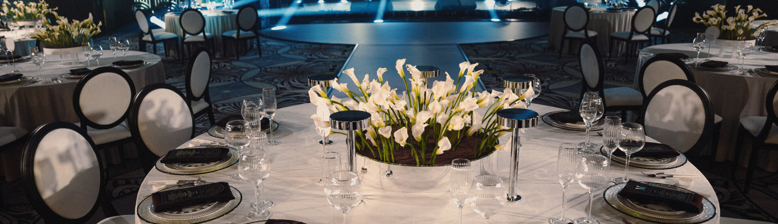 Private dinner · calla lilies and glass